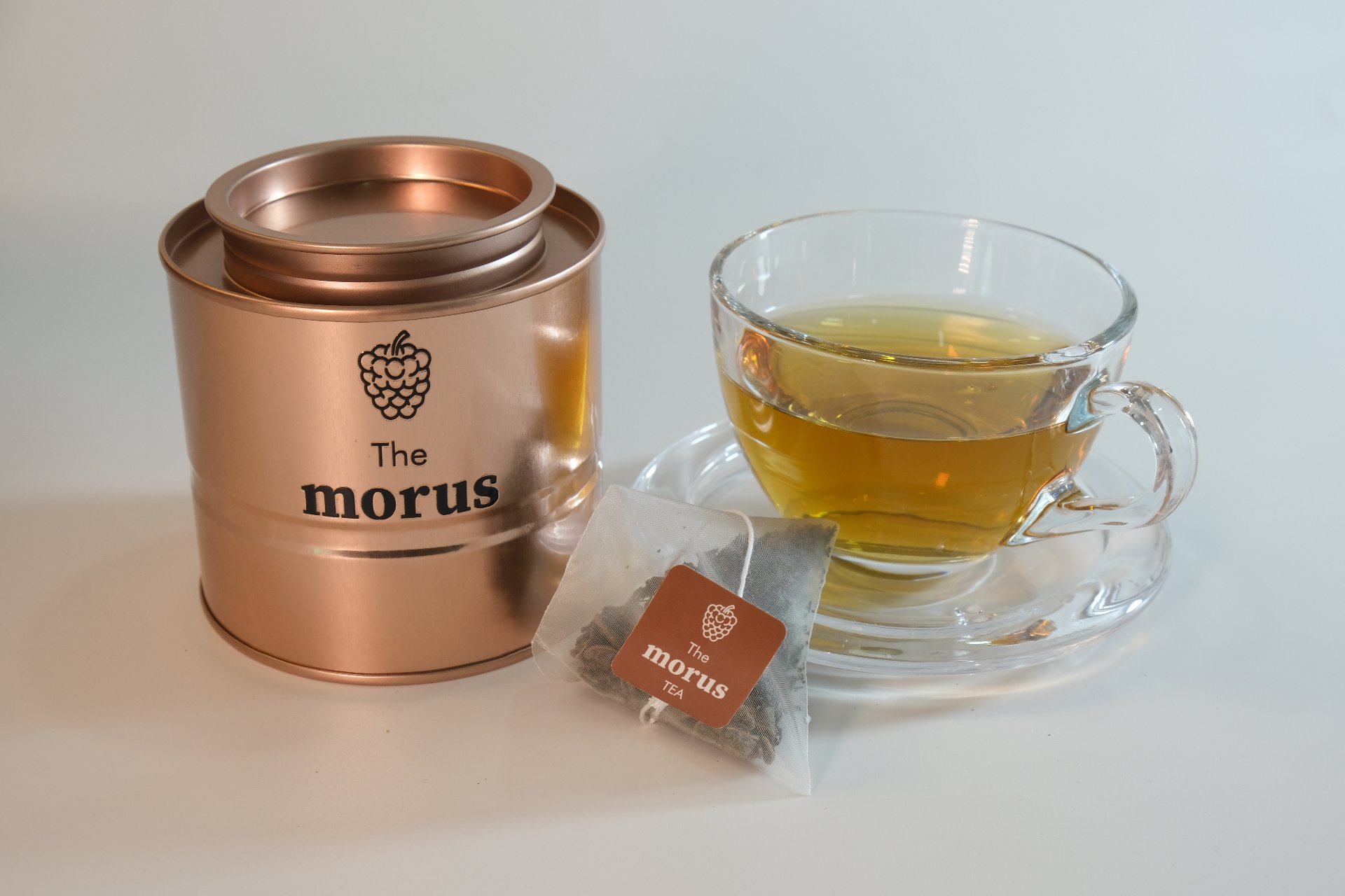 桑社金桑養生茶 — 罐裝與茶湯